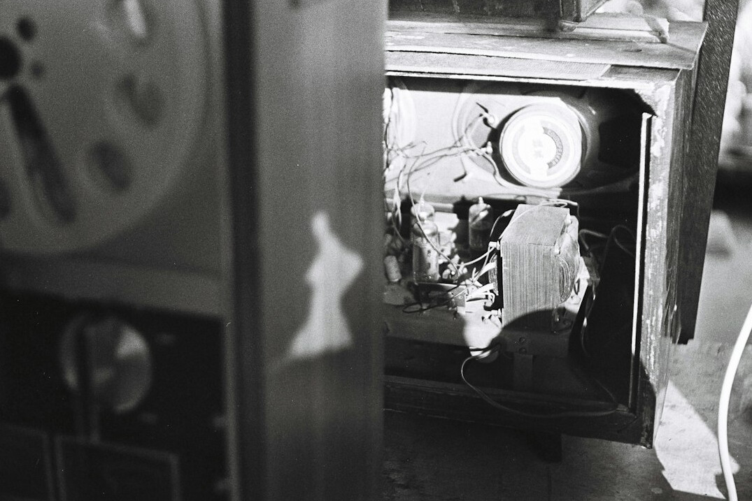 Vintage television studio camera filming in a retro advertising production set